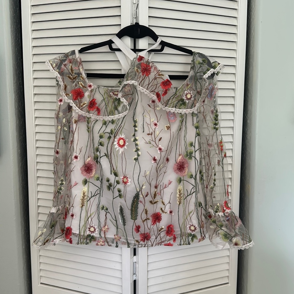 Alpha and omega embroidered lacy blouse